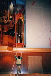 Raising the large carving, Fritts pipe organ, Pacific Lutheran University, Tacoma WA, wood carver Jude Fritts